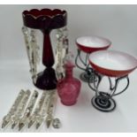 Glass to include a ruby glass lustre with extra drops, cranberry glass jug and two art glass vases.