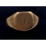 A 9 carat gold signet ring. Broken shank. Weight 3.2gm.