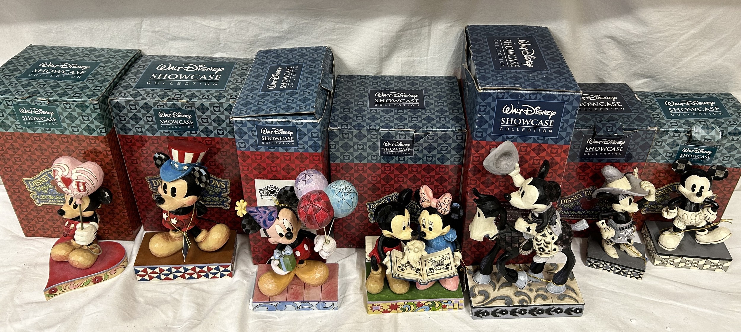 A Selection of 7 'Walt Disney SHOWCASE collection figurines all boxed, to include - Mickey with