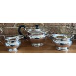 A three piece silver tea-service with ebony knop and handle, Sheffield 1908, maker Atkinson