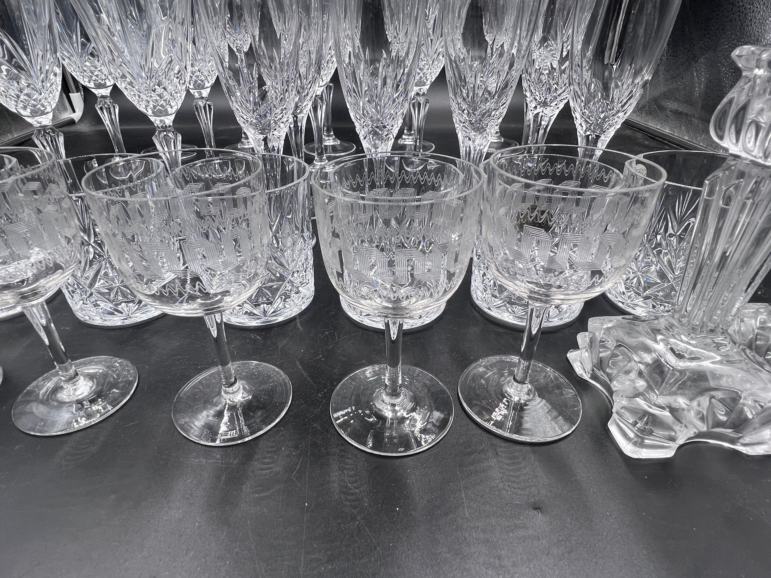 A collection of glass to include champagne flutes, wine glasses, whisky tumblers etc. approx 34 - Image 3 of 8