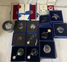 A collection of boxed Swarovski crystal ornaments to include flowers, hearts, shells etc.