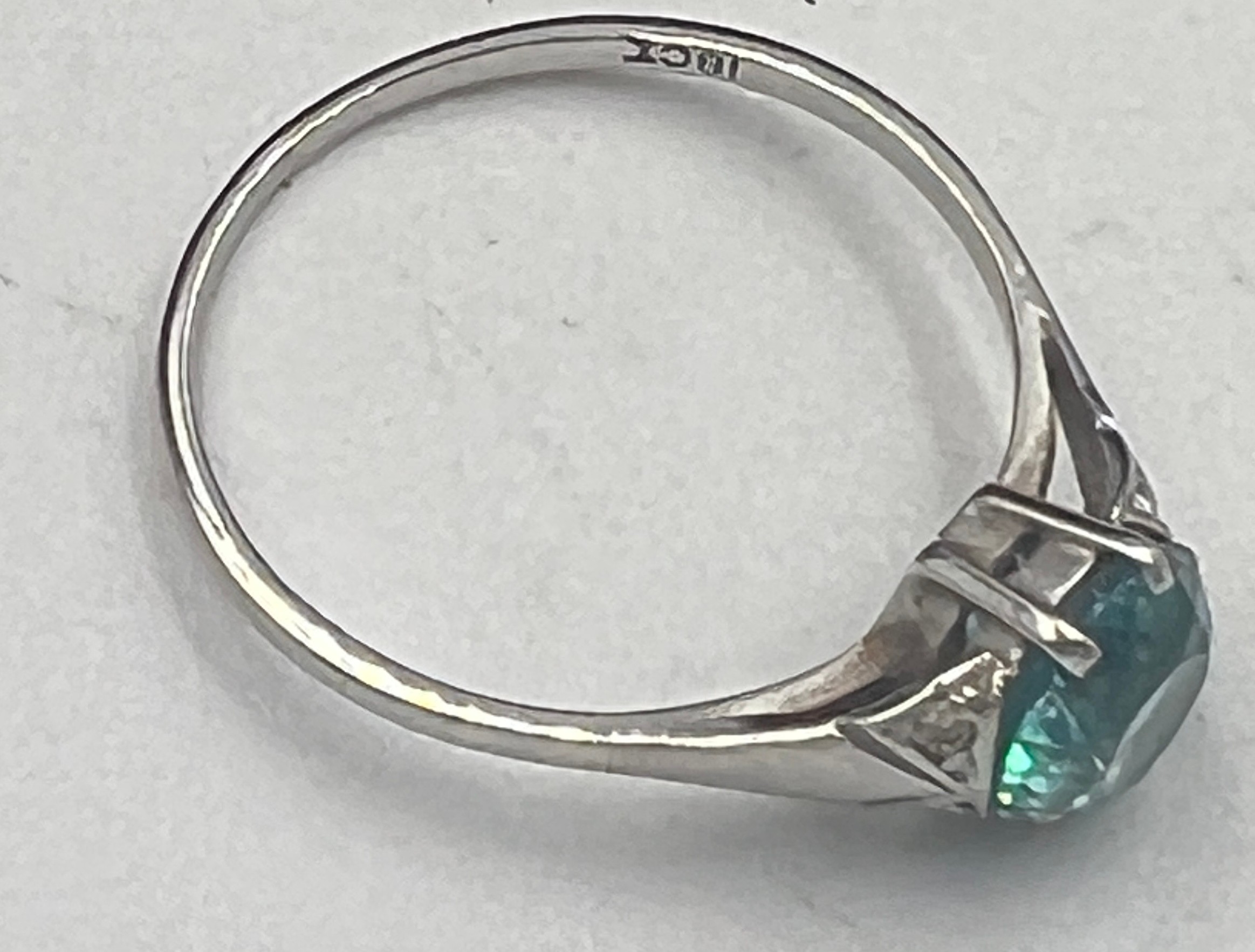 An 18 carat white gold ring set with blue and clear stones. Size O. Weight 1.8gm. - Image 3 of 3