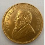 A South African full gold Kruggerand 1974.