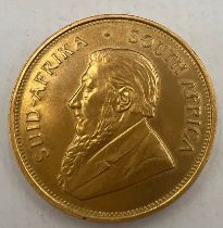 A South African full gold Kruggerand 1974.