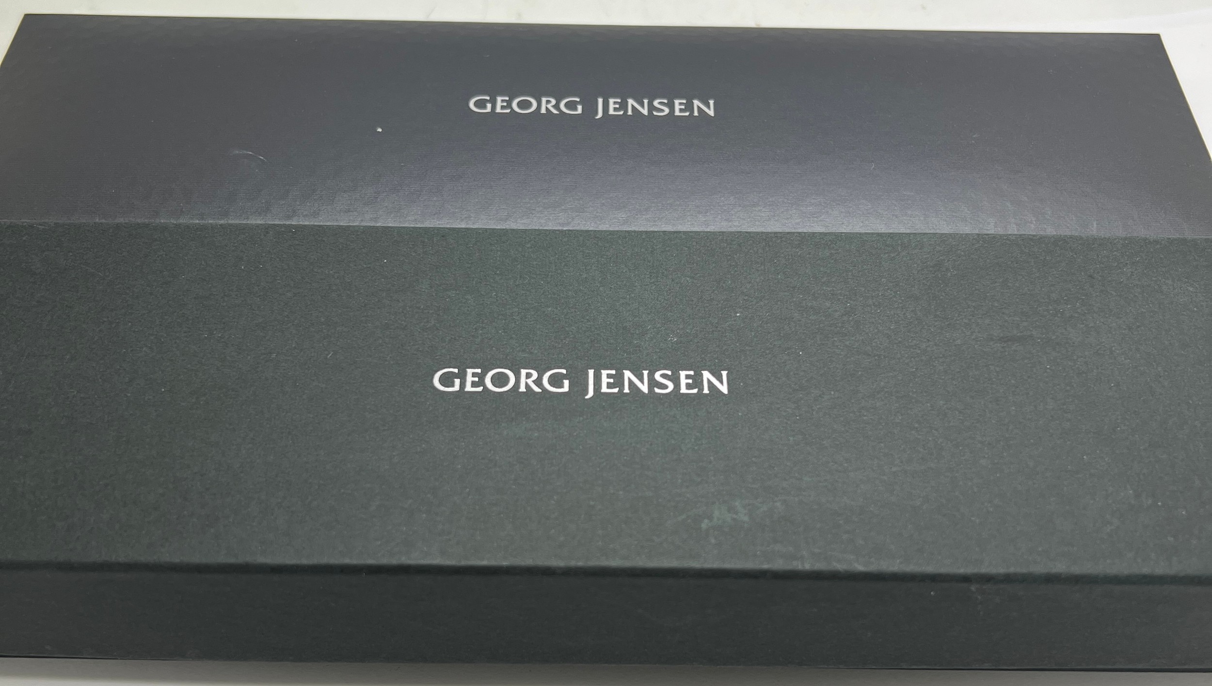 A boxed Georg Jensen Offspring .925 silver and .750 gold bracelet in original presentation box. - Image 4 of 4