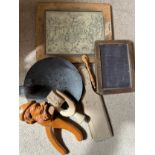 A miscellany to include wooden nutcrackers, butter pats, pastry wheel, pastry roller, metal