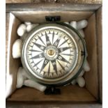 A gamble mounted ships compass in wood outer case, lacking lid. Case 18cm x 18cm. Maker Georg