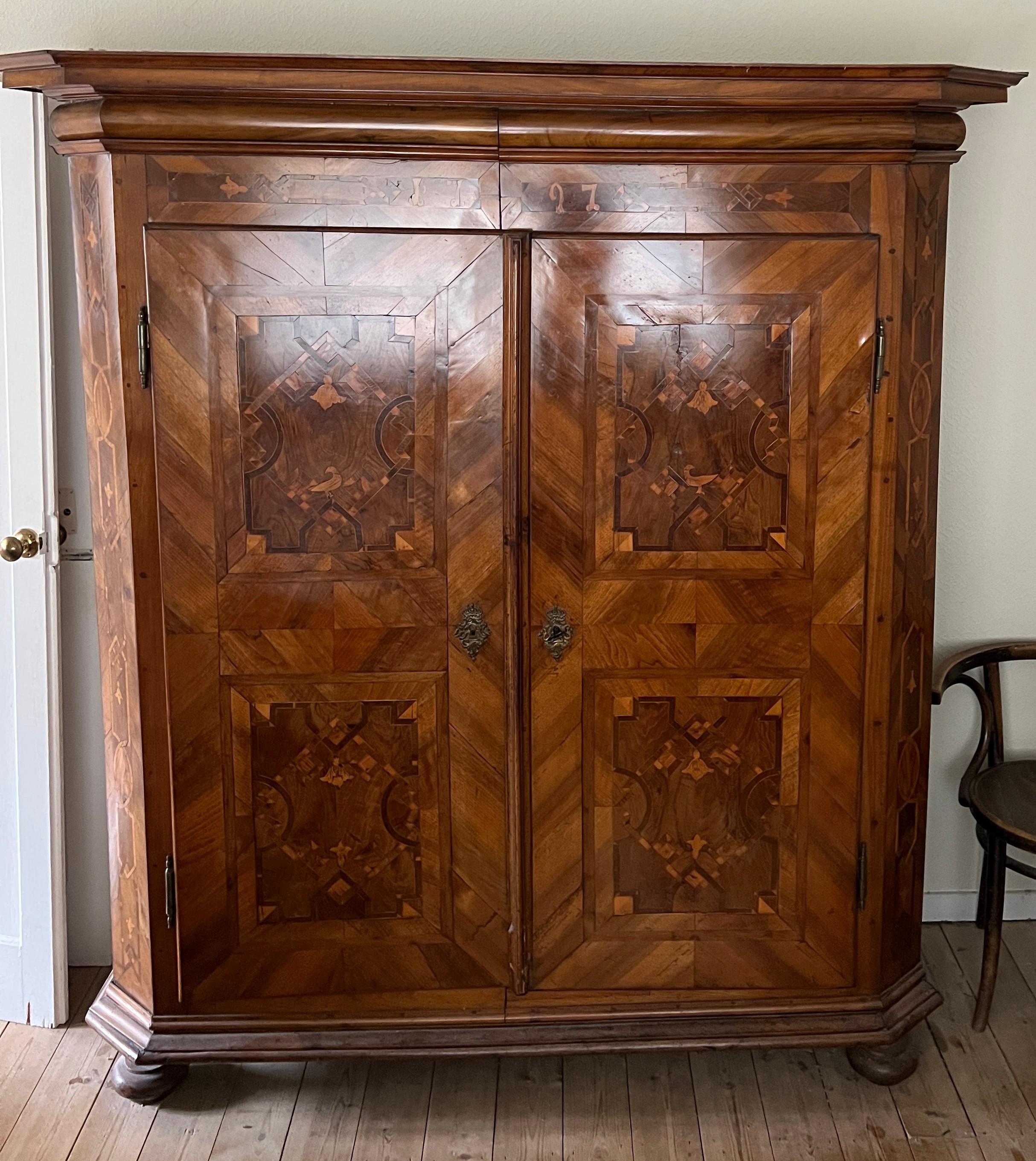 An 18thC Austrian inlaid two door wardrobe on bun feet. Dated 1727 to the top. 202cm h x 57cm d x - Image 4 of 20