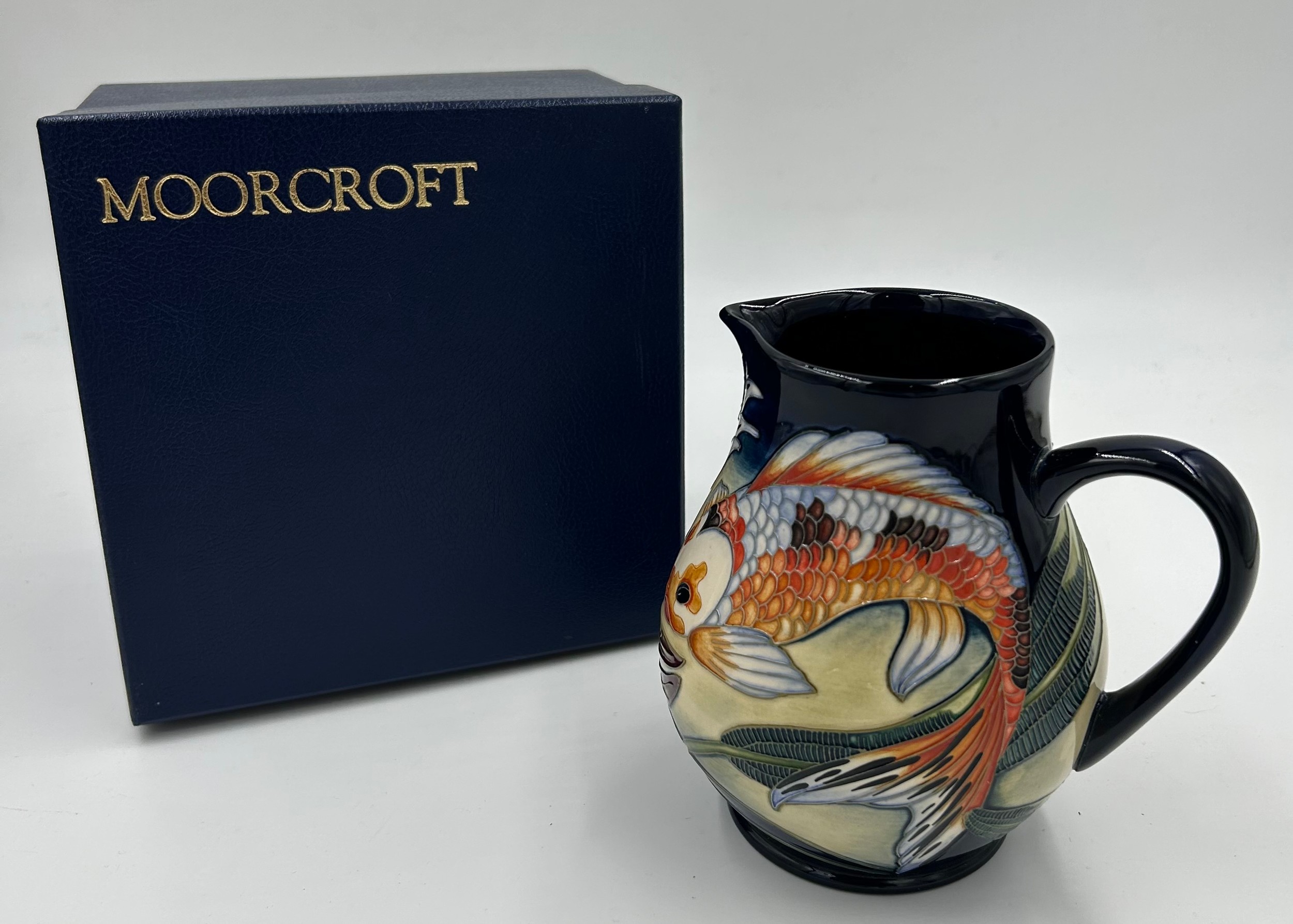 A boxed Quiet Waters Moorcroft jug, dated 2002. 15cm h. - Image 2 of 5