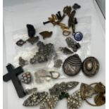 A quantity of vintage jewellery, pen nibs etc to include silver locket, jet cross, micro mosaic