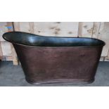 A 19thC copper bath tub. 153cm l x 63cm w at widest point x 46cm w at narrowest x 76cm h.