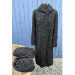 Various items to include a lined curly lambs wool coat along matching bag/muff and hat. Coat