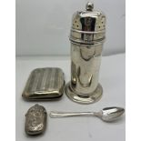 A quantity of silver to include sugar shaker, cigarette case, vesta case and a coffee spoon. Various