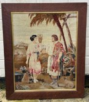An oak framed needlepoint tapestry depicting a shepherd and a water carrier. Tapestry 63 x 50cm.