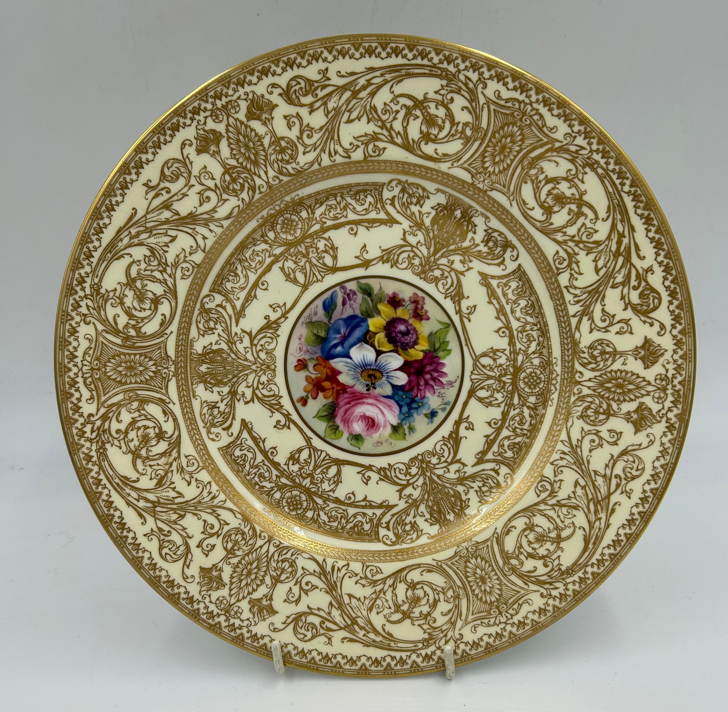 A Royal Worcester hand painted cabinet plate signed H.H. Price, decorated with flowers. 27cm d.
