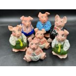 Wade Natwest 19thC ceramic porcelain piggy banks to include two baby Woody, one Lady Hilary, two