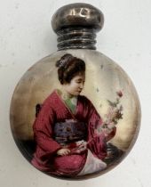 A ceramic scent bottle with a Japanese lady to the front with a silver screw on lid. Birmingham