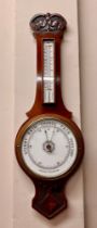 A vintage mahogany aneroid barometer 80cm l, dial 21cm w.