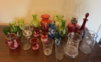 A quantity of mainly Victorian coloured and clear glass some with Mary Gregory style decoration.