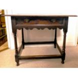 An 18thC oak side table with single drawer to front. 91cm w x 56cm d x 74cm h.