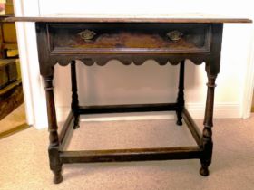 An 18thC oak side table with single drawer to front. 91cm w x 56cm d x 74cm h.