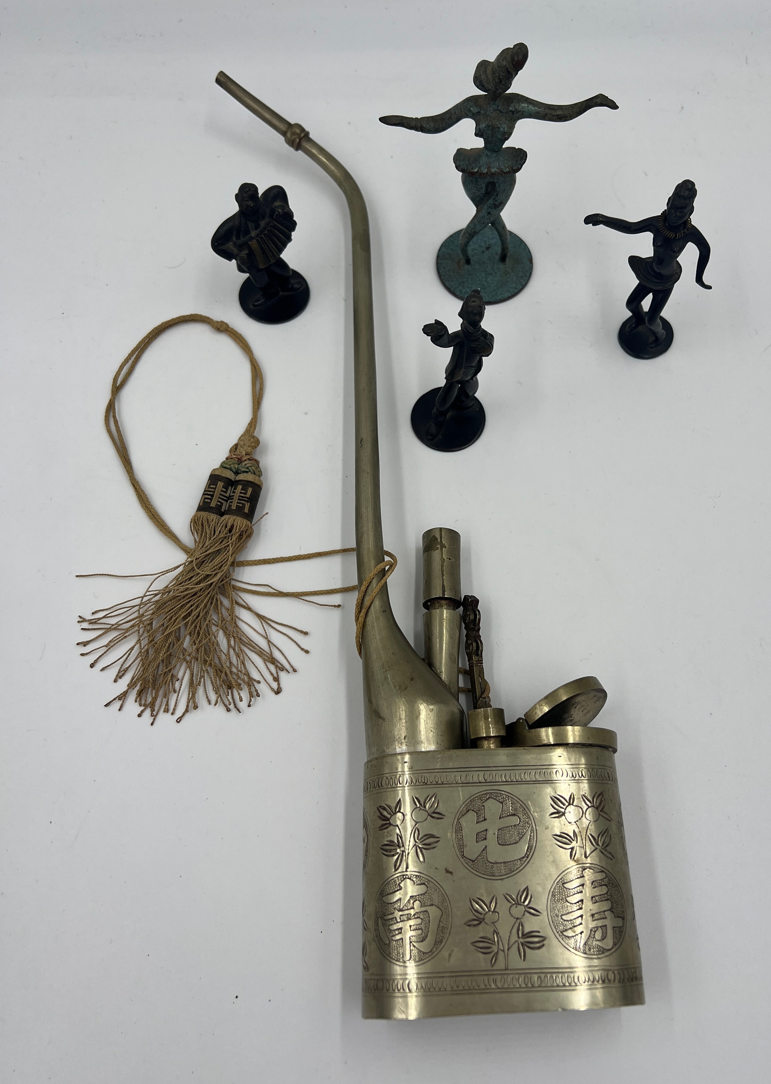 Four metal figures and a Chinese metal opium pipe. - Image 3 of 4