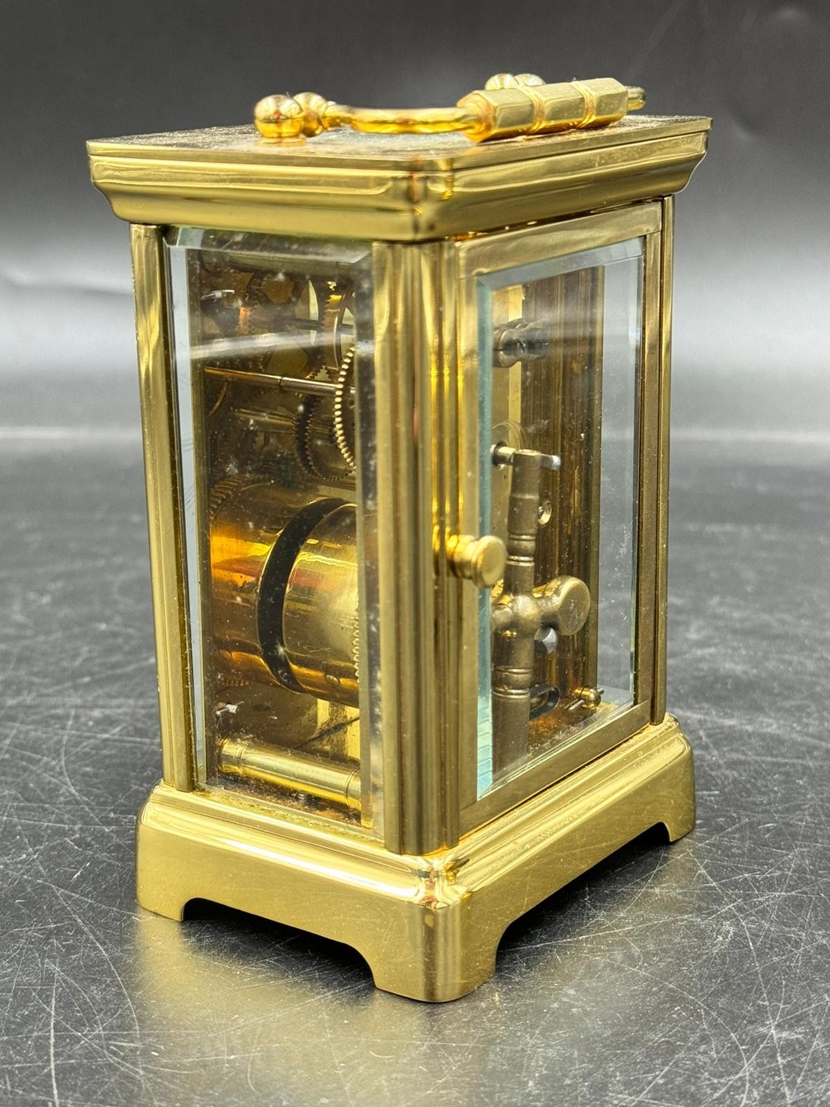 Two brass case carriage clocks to include Garrad & Co London W1 and Henley England marked to back - Image 10 of 11