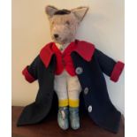 A vintage toy fox in hunting attire. 43cm h.