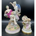 Continental figurines to include a figural group depicting a reclining man with an angel and two