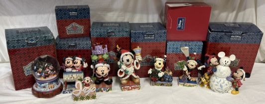 A Selection of 8 'Walt Disney Disney Traditions Christmas SHOWCASE collection figurines all boxed,