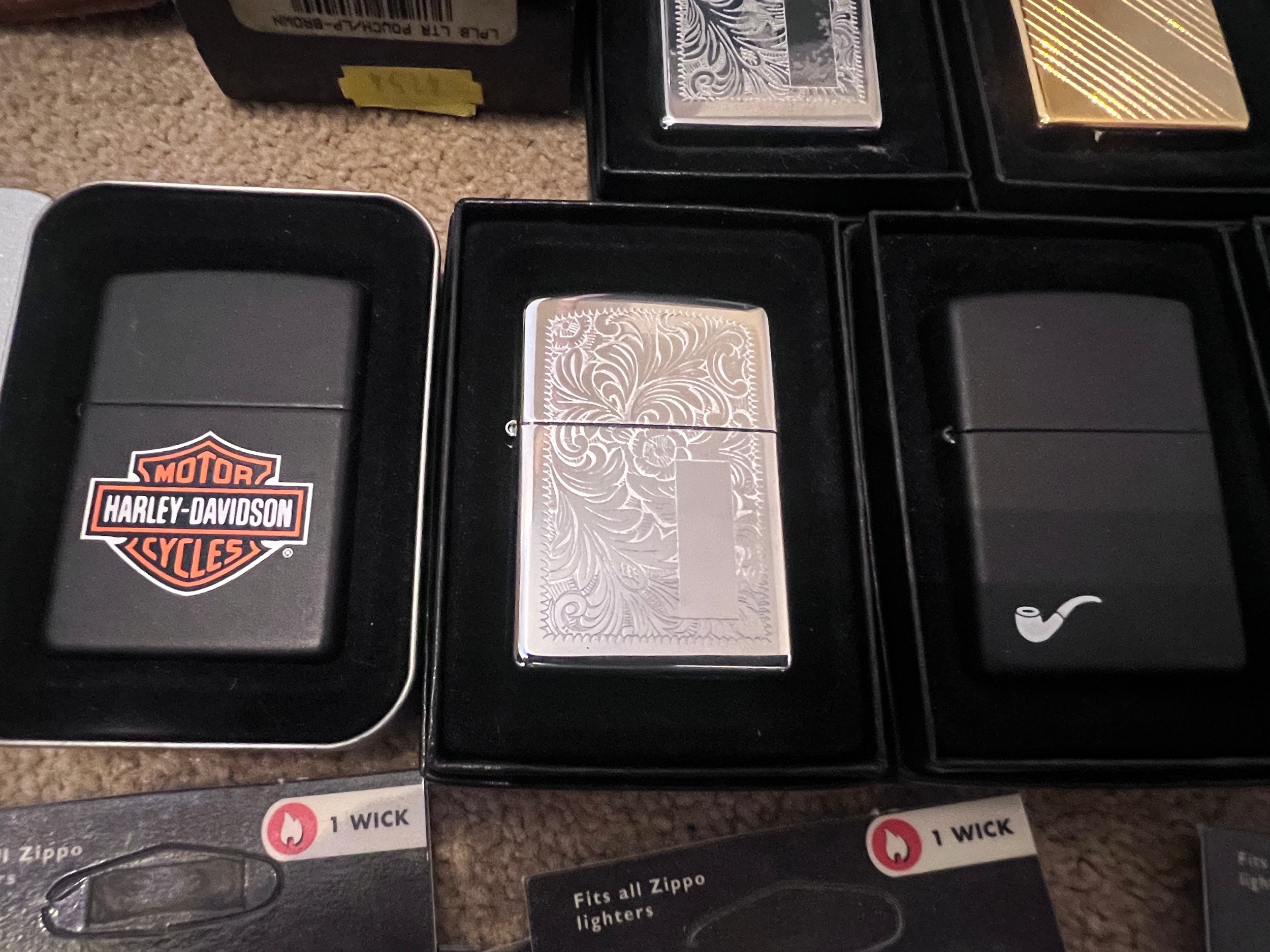 A large collection of mostly boxed Zippo lighters to include Harley Davidson, Bunny, older brass - Image 4 of 10