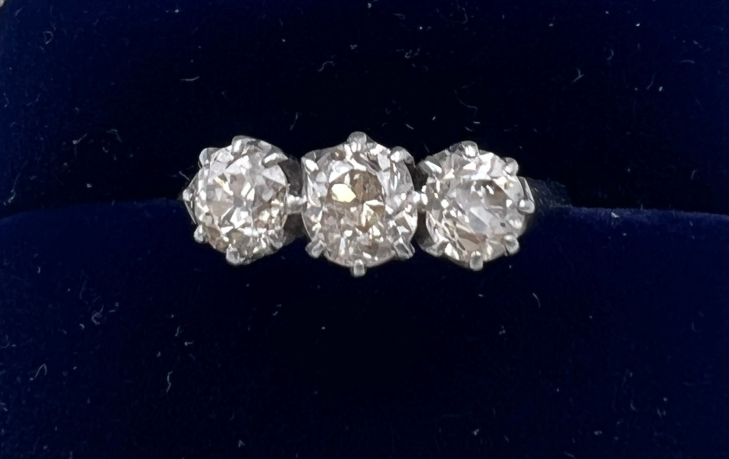 A three stone diamond ring mounted in platinum. Size K. Weight 3.5gm. Approximate diamond - Image 3 of 7