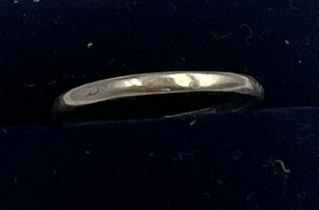 A platinum wedding band. Size M. Weight 2.3gm.