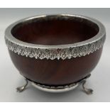 A turned wood and silver mazer bowl. Birmingham 1903, maker Thomas Hayes. 10.5cm d.