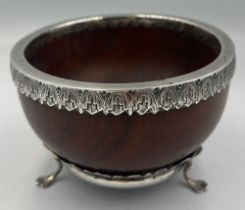 A turned wood and silver mazer bowl. Birmingham 1903, maker Thomas Hayes. 10.5cm d.