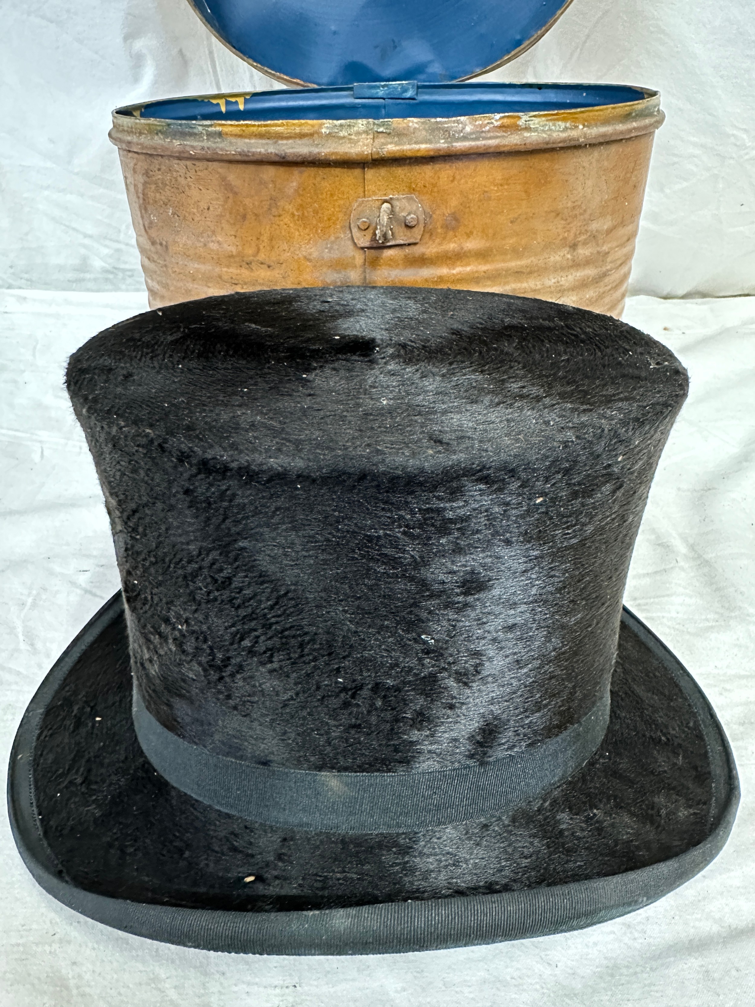 A silk top hat by J Robinson & Sons, Driffield. Approx. circumference 58cm, in a metal hat box. - Image 6 of 6