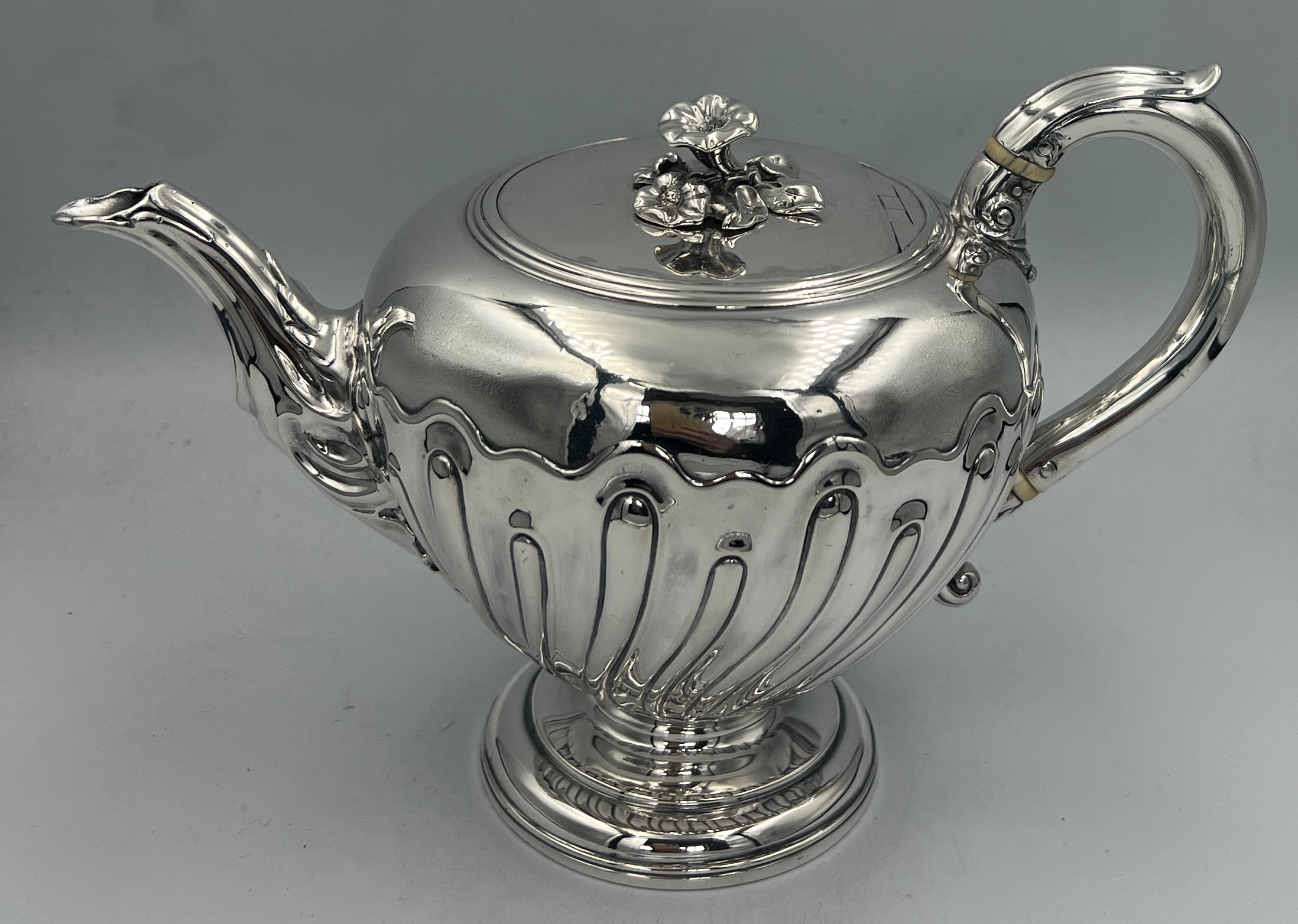 Silver teapot with ivory to handle, London 1838, maker John Wilmin Figg. Weight 542gm.