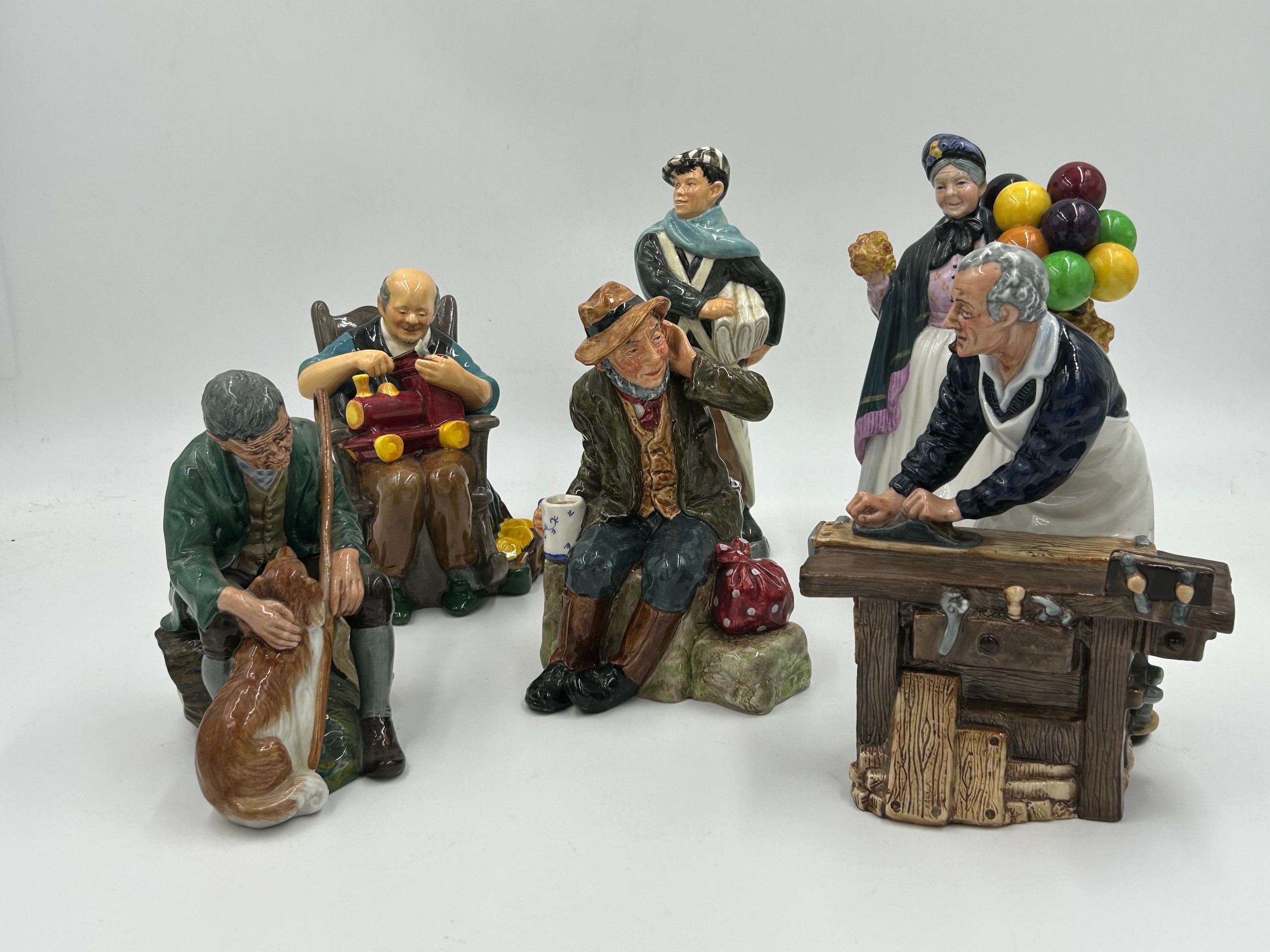 A collection of 6 Royal Doulton figurines to include 'The Carpenter' HN 2678, 'The Toymaster' HN