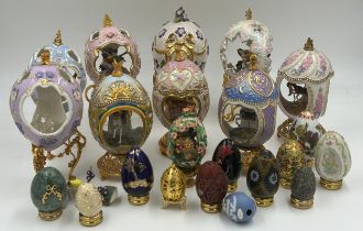 A collection of Franklin Mint House of Fabergé Eggs to include 4 x Carousel Horse eggs on fixed