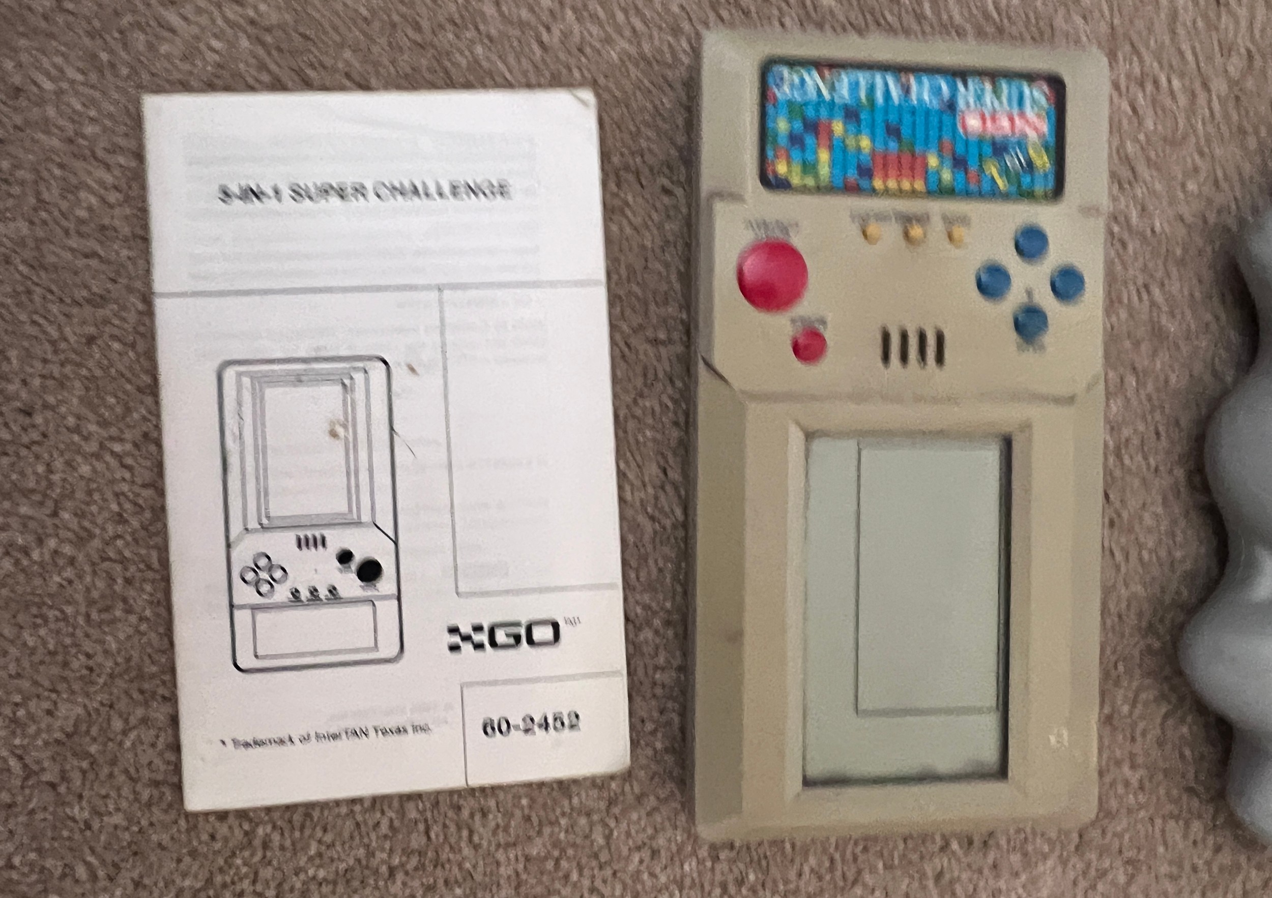 A Go 5-in-1 super challenge handheld game console together with a Radioshack handheld shooting game. - Bild 2 aus 3