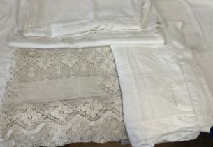 A crocheted linen double bedcover, a double linen sheet and a large linen tablecloth.