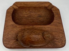 A Peter Heap ‘Rabbitman’ oak ashtray. 10cm x 8.5cm. Marked to underside N with tree.