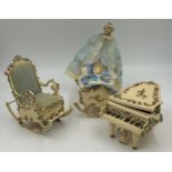 Three Reuge German musical boxes to include a Grand Piano (Doctor Zhivago theme), a Rocking Cradle