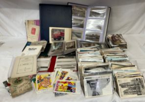 A large quantity of postcards (1500+) in 4 albums relating to Ships/Boats, Trains & Railway, seaside