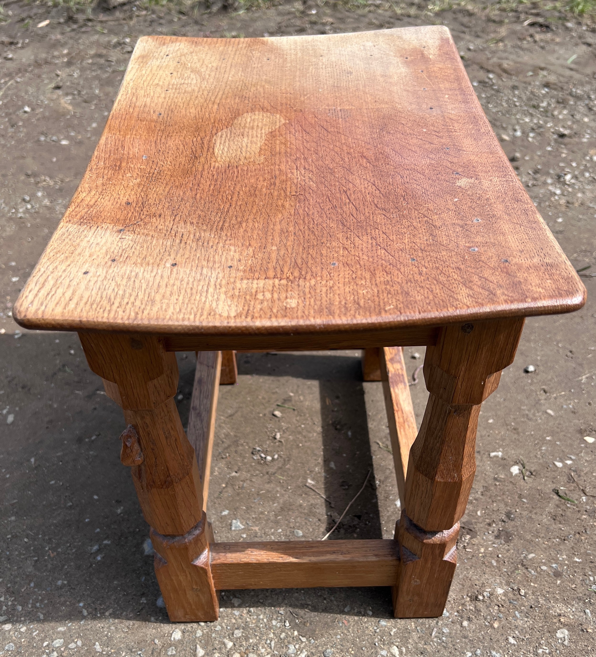 An oak Robert 'Mouseman' Thompson stool with adzed top. 40cm w x 27.5cm d x 31cm h. - Image 4 of 4