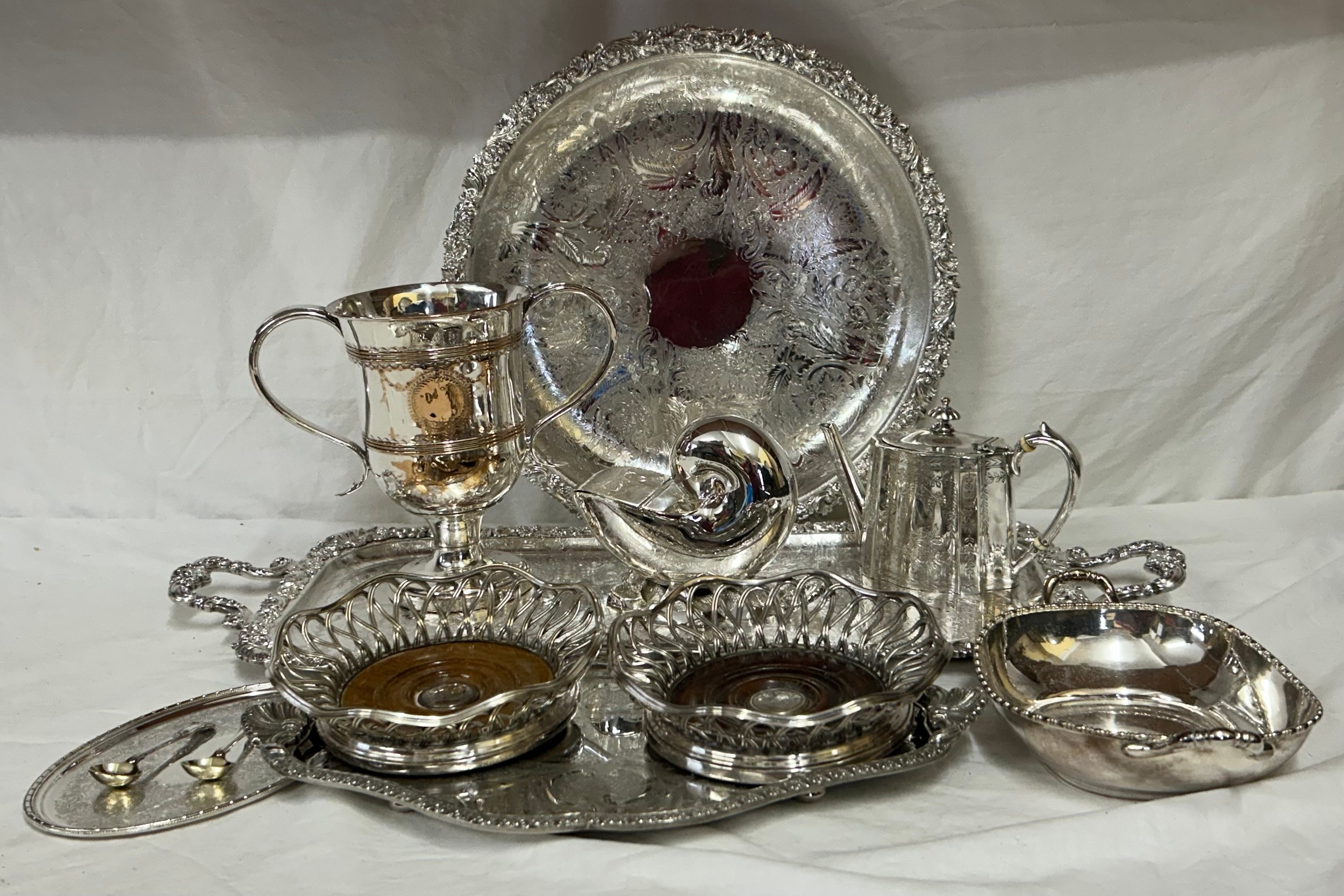 A quantity of good quality silver plated items to include a heavy Barker Ellis ornate oblong twin