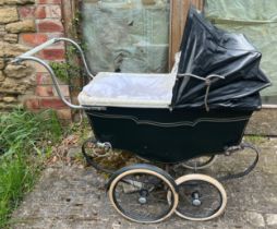 A Pearson & Pearson vintage dolls pram. 94cm h x 110cm l.