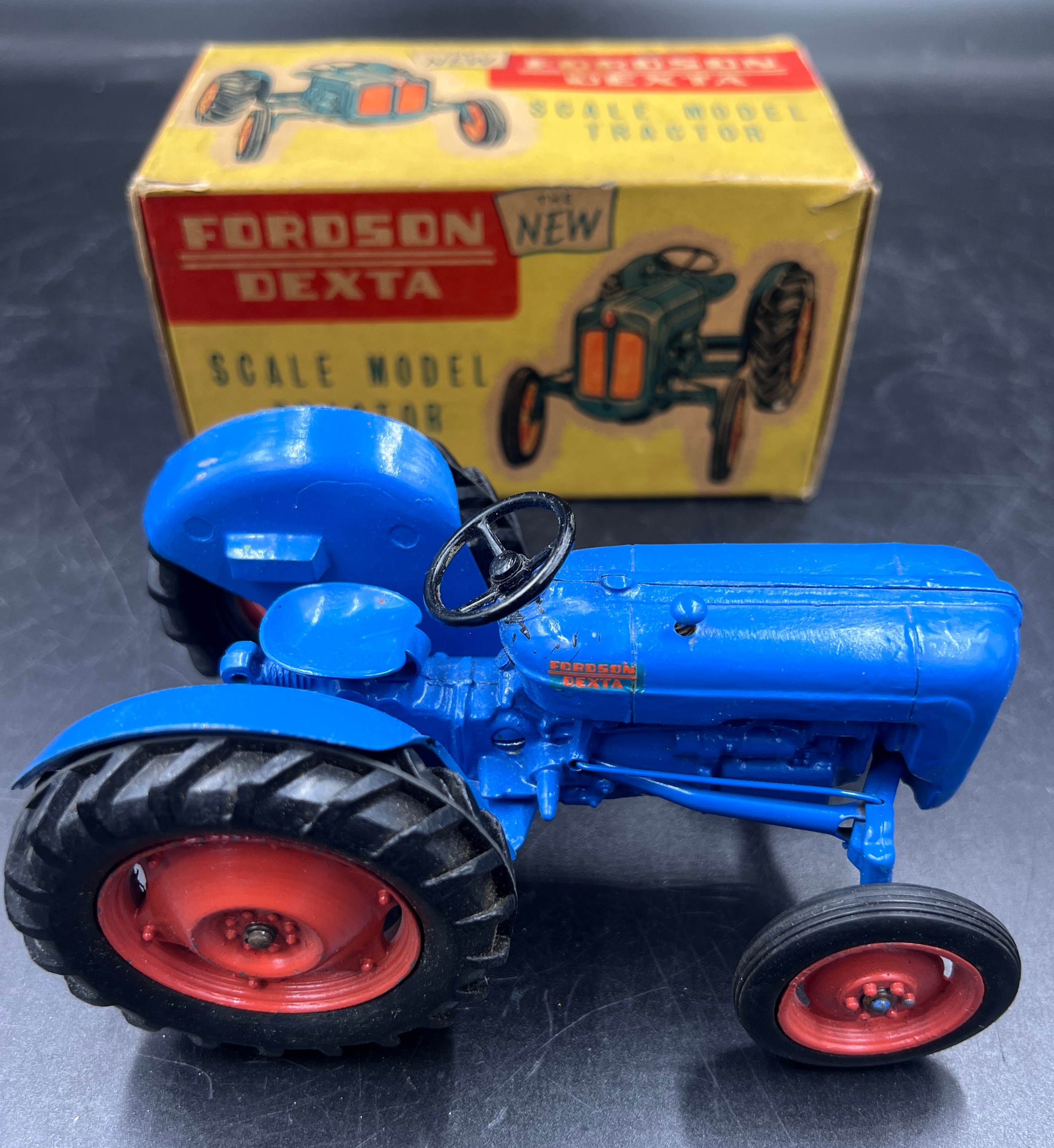 A boxed Chad Valley 1/16 Fordson Dexta Tractor, excellent example.