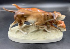 A mid-20th century Royal Dux porcelain figure group of two hunting dogs, 36cm w.